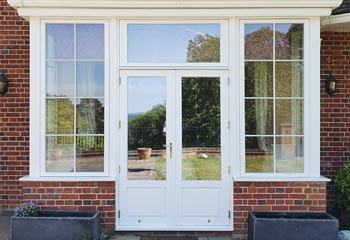 French Doors with Period panels finished with Polished Brass hinges