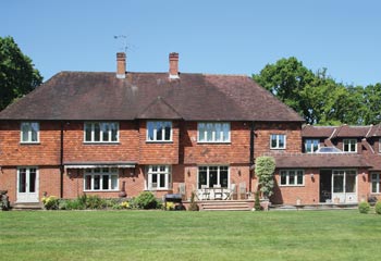 Multiple pane steel windows were replaced with traditional casements in plainer design to maximise the country views and light