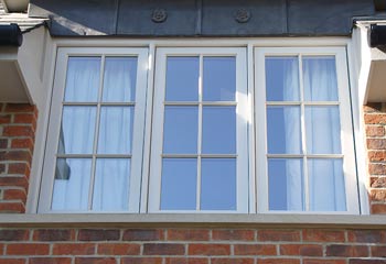 Recessed Casement windows fitted behind brick for extra protection from the elements