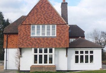 Replacement and new timber Flush casement windows and doors with Leaded lights for cottage in Tadworth, Surrey