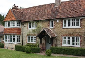 Replacement and new Flush timber casement windows and doors for this 1920’s cottage in Leigh, Surrey Hills