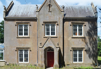 The most uncommon Gothic recessed timber casement windows and doors for this handsome Georgian Country Home in Wonersh, Surrey