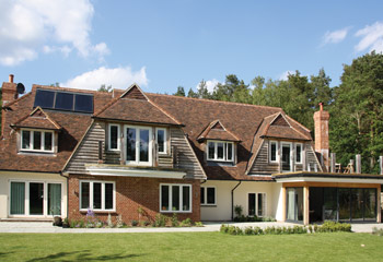Stylish Flush Casement timber windows and French doors for this individual Arts & Crafts House in Witley, Surrey