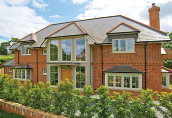 Recessed Edwardian timber casement windows and doors for this unexampled new build Home in Traditional design in Farnham, Surrey