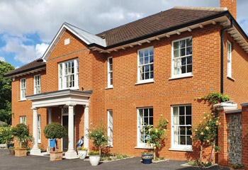 Slimline Georgian design timber sash windows for this chic newbuild home in Ascot, Berkshire