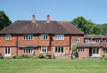 Timber Flush Casement windows and doors for this extended and refurbished country home in Coulsdon, Surrey