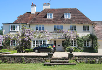 Timber Flush casement windows and doors for this stunning 1930’s country house in Shamley Green, Surrey