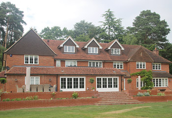 Recessed Casement timber windows, French & Bifold Doors for this grand and elevated Country House in Sunninghill, Berkshire
