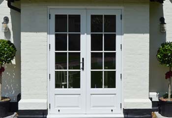 Double French Doors with period panels and glazing bars